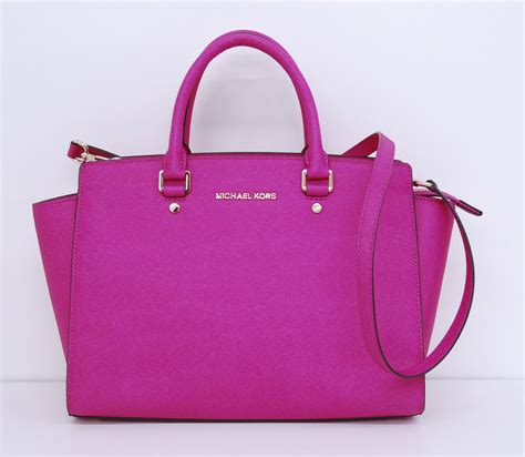 michael kors dark pink purse|Michael Kors pink suitcase.